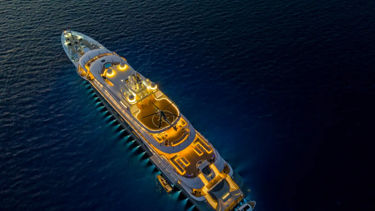 Engineer commissioning AV/IT systems aboard a superyacht